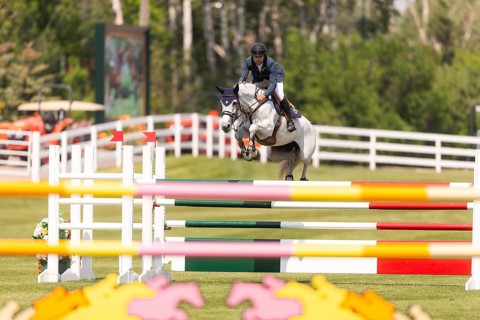 Daniel Bluman of Israel and riding Corbie V.V., compete in the 1.60m Grand Prix during The