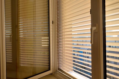 Blinds are fitted to a window to protect against heat and sun. Austria