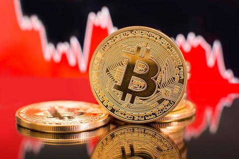 Bitcoin with a red chart drop. Price crash and bear market trend concept