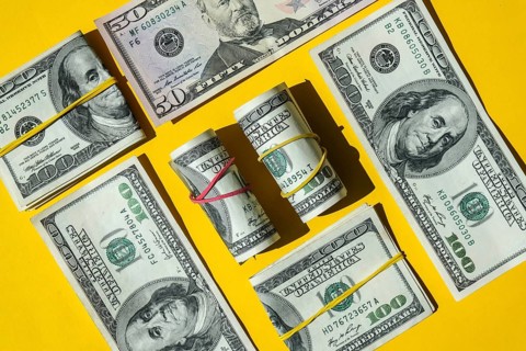 Us dollar bills are creative layout. Business concept, development perspective. Flat lay. Top view.