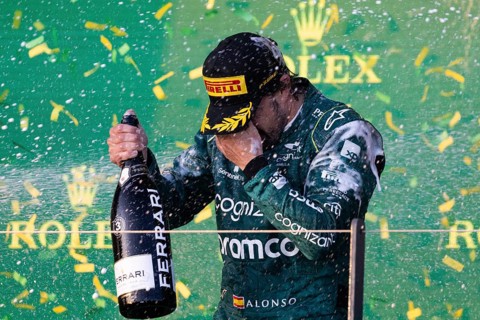 MELBOURNE, AUSTRALIA, APRIL 2: Fernando Alonso of Spain celebrates his 3rd place for Aston Martin