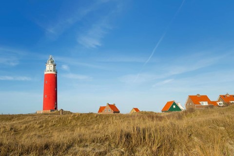 Red lighthouse at the Dutch island Texel