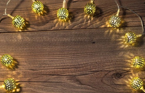 The photo shows a wooden background with free space for text messages
