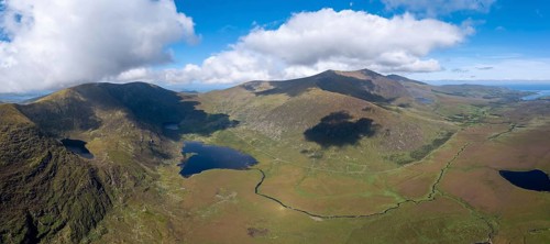 A panorama aerial view of the Mountains of the Central Dingle Peninsula and Connor Pass in County