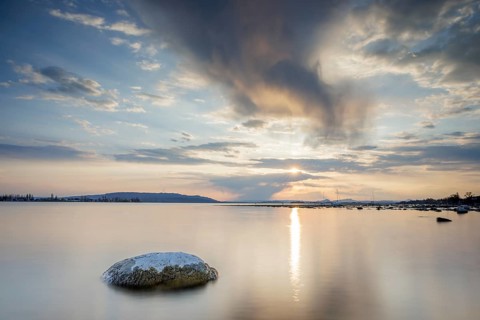 Sunset over a lake, dramatic clouds form in the sky, Seegarten, Allensbach, Lake Constance,