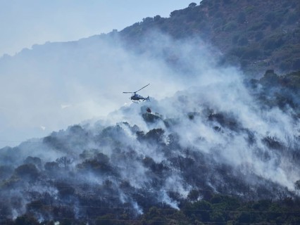 A picture of fire fighters in the sky