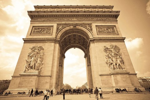 The Arc-de-Triomphe in Paris, France. Toned on sepia (old photograph) . Austria