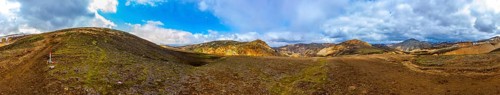 Icelandic volcanic mountain landscape in panorama. Hiking trail laugavegur in Fjallabak. Travel and