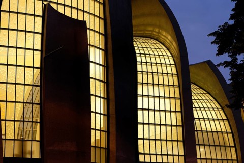 Illuminated windows of the Cologne mosque in the blue hour