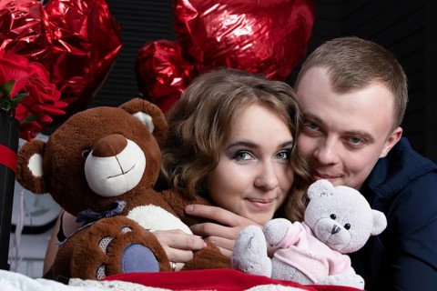 Boyfriend and girlfriend on Valentine's Day. Portrait of lovers. A man and a beautiful woman with