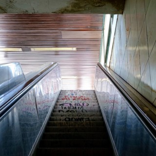 Old, graffitoed escalator at U Yorckstraße subway station in Berlin, Germany in July 2018