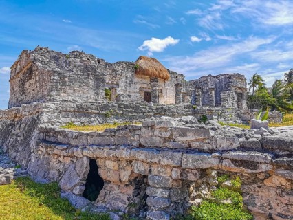 Ancient Tulum ruins Mayan site with temple ruins pyramids and artifacts in the tropical natural