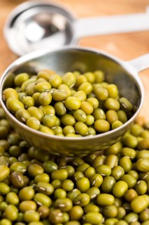 Mung beans over wooden spoon, lodz, poland