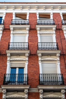 Old residential building in central Madrid. Real estate, renovation and maintenance concepts