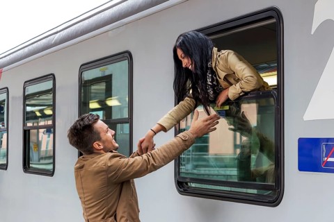 Parr arriving or saying goodbye on a platform at a railway station Austria