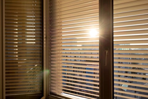 Blinds are fitted to a window to protect against heat and sun. Austria
