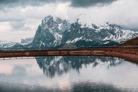 Water reservoir on the Seiser Alm in the Dolomites in South Tyrol, Italy, Europe