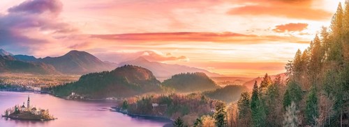 Panoramic view with the Bled island, the lake and the surrounding hills, in amazing colors due to