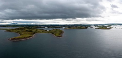 Drone panorama landscape of Rosmoney Pier and marina and the drumlin islands of Clew Bay