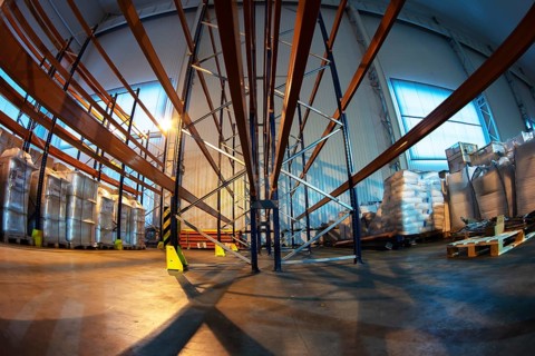 Storage rooms in a factory or workshop with metal shelving