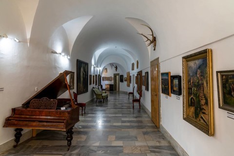 Bojnice, Slovakia, 26 September, 2022: corridor with paintings and musical instruments inside the