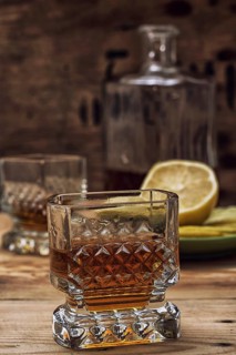 Seasoned brandy into the glasses and decanter vintage style