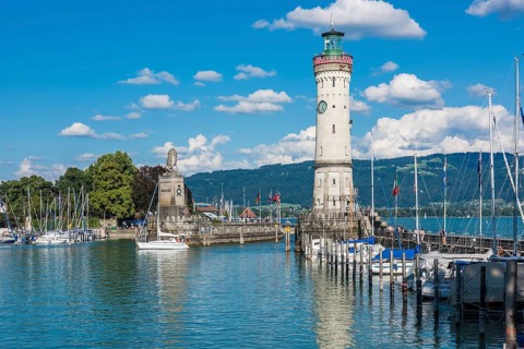 GERMANY, LINDAU - AUGUST 21: view of the lighthouse and a lion statue at the entrance to the port