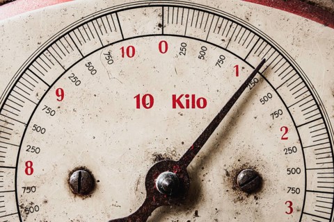 Close-up shot of retro and vintage scale or balance indicating weight in kilo