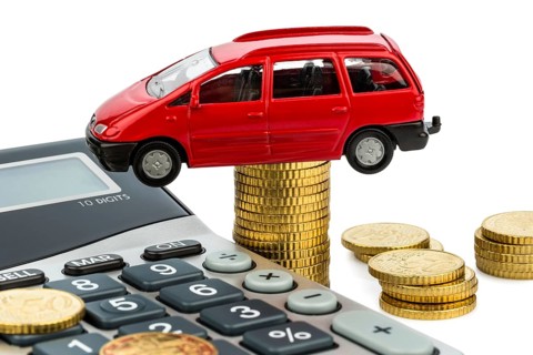 Car and calculator. Rising costs for car purchase, leasing, workshop, refuelling and insurance