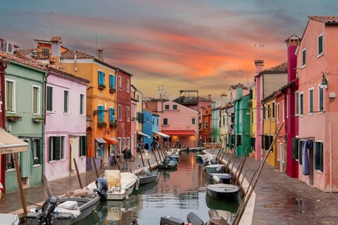 Colorful Houses in Burano beneath a scenic sky, Island of Venice, Italy, Europe
