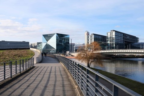 Berlin, Germany, February 12, 2022, view from the riverside promenade at the Spreebogenpark to the