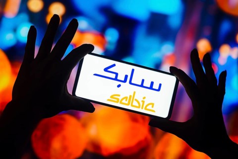 In this photo illustration, the SABIC logo is displayed on a smartphone screen