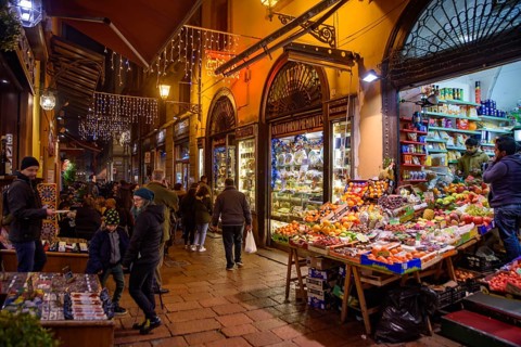 People walking on the street in the old town of Bologna, Italy, Europe