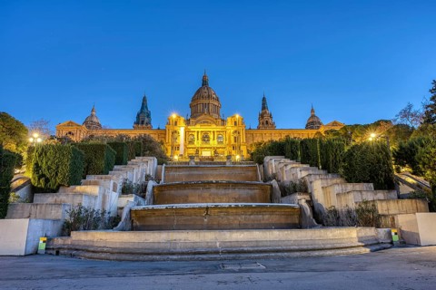 The National Palace on the Montjuic hill in Barcelona illuminated at dusk