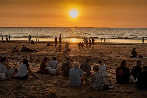 People watching the sunset on the beach, Mindil Beach, Darwin, Northern Territory, Australia,