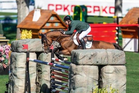 Cian O'Connor of Ireland, riding Fancy de Kergane compete in the BMO Nations Cup during the CSIO