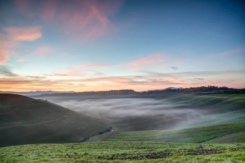 A beautiful misty sunrise in Tuscany