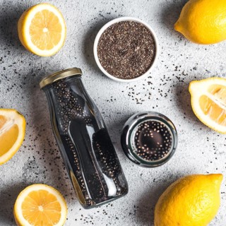 Detox activated charcoal black chia water or lemonade with lemon. Two bottle with black chia