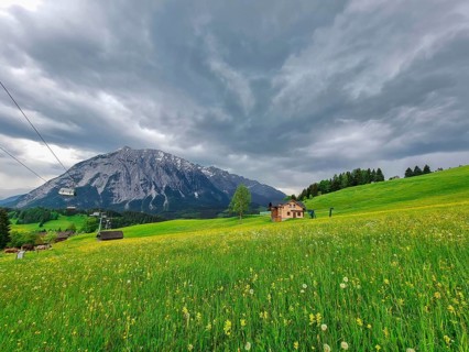 Summer austrian landscape with Grimming mountain (2.351 m), an isolated peak in the Dachstein
