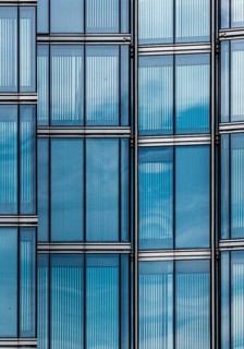 Brussels Old Town, Belgium, 07 05 2019- Abstract view of the rectangular blue windows in glass and