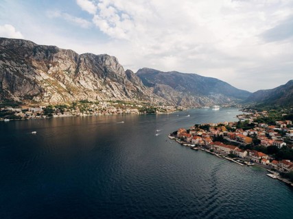 Kotor Bay, photo from a drone, near the city of Prchan. View of the town Dobrota and Kotor, and the