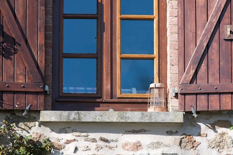 French windows with shutters and light equipment