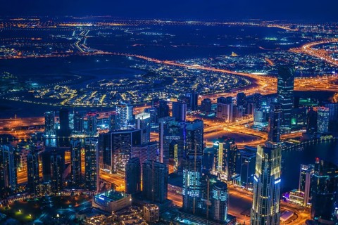 Dubai night view seen from the observation deck of Burj Khalifa. Shooting Location: Dubai
