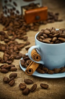 Composition of coffee beans and cup