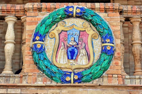 Plaza de España in Seville, Seville, Andalusia, Spain, Europe, A colourful relief of a coat of arms