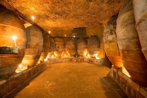 Antique winery in Spain with clay vessels terracotta amphora pots Mediterranean tradition with