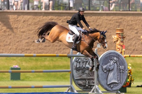 Vaclav Stanek from Czechoslovakia, and riding Quintin, compete in the 1.60m Grand Prix during The