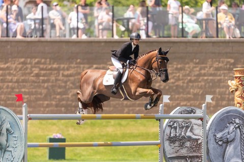 Tiffany Foster of Canada and riding Electrique, compete in the 1.60m Grand Prix during The