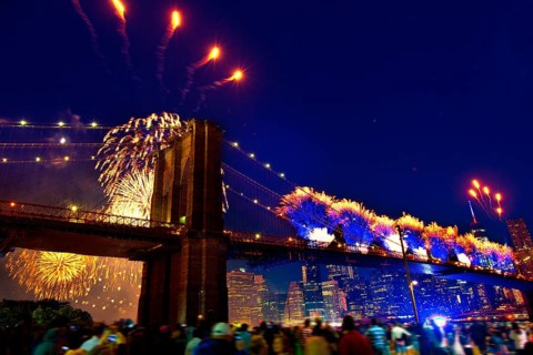 July 4th 2014 fireworks at Brooklyn bridge Manhattan skyline New York USA