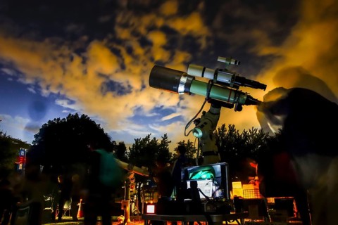 Image of astronomical observations at the telescope. Shooting Location: Tokyo metropolitan area